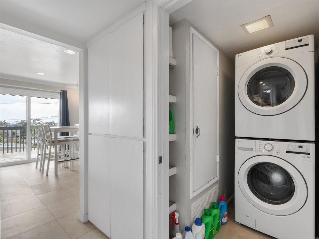 852 Dewitt Avenue Encinitas, CA 92024 - Photo 28 of 41 a view of a hallway with washer and dryer