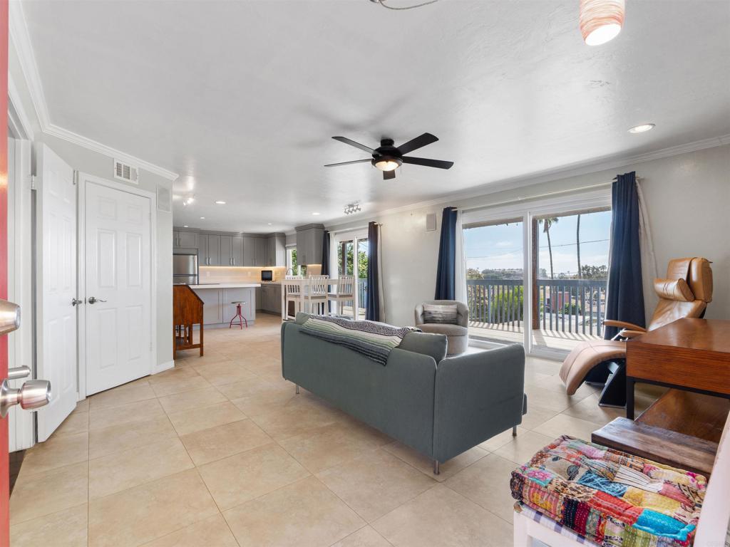 852 Dewitt Avenue Encinitas, CA 92024 - Photo 4 of 41 a living room with furniture and a large window
