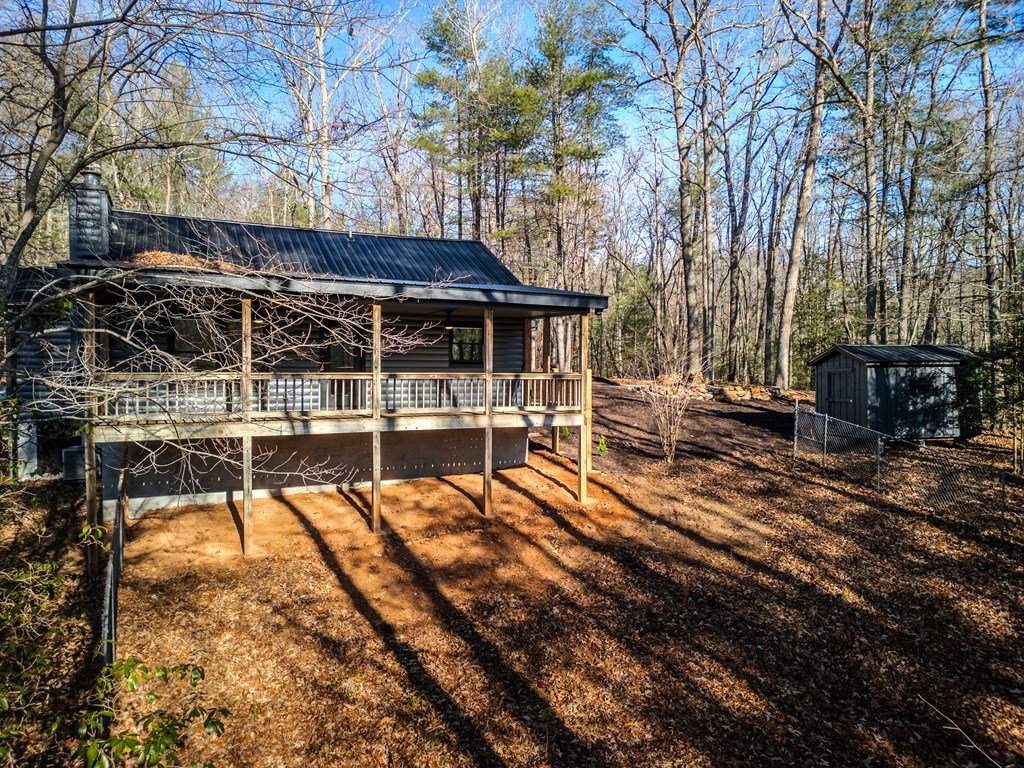 292 Wits End Way Cherry Log, GA 30522 - Photo 21 of 32 a view of a swimming pool with a patio