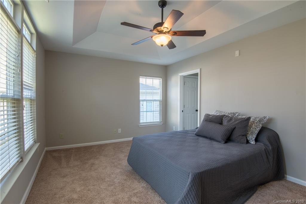 11712 Kennon Ridge Lane Huntersville, NC 28078 - Photo 16 of 31 a bedroom with a bed and window