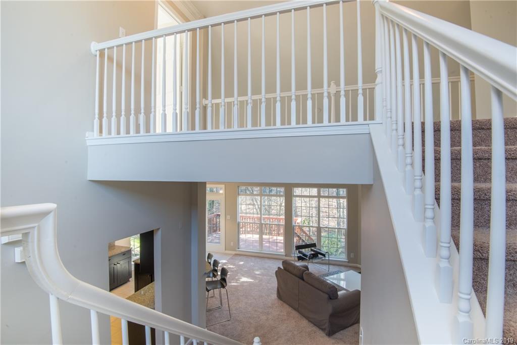 11712 Kennon Ridge Lane Huntersville, NC 28078 - Photo 23 of 31 a living room with furniture and a large window