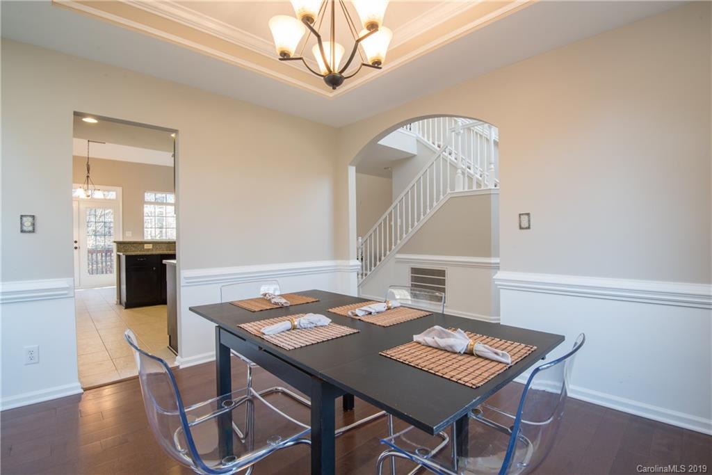 11712 Kennon Ridge Lane Huntersville, NC 28078 - Photo 25 of 31 a view of a dining room with furniture