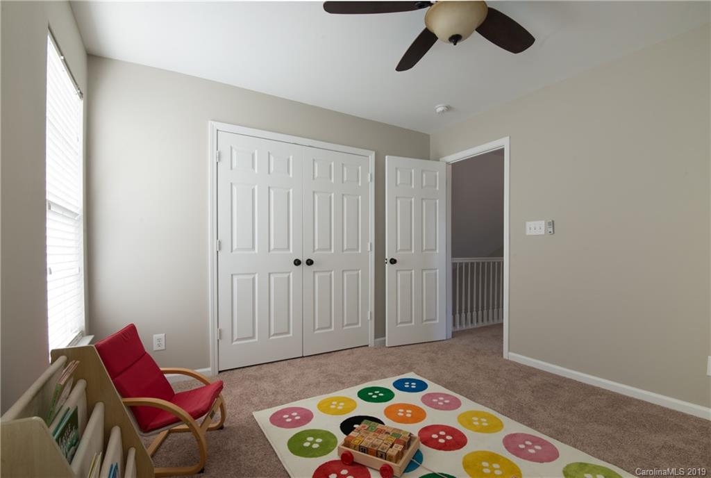 11712 Kennon Ridge Lane Huntersville, NC 28078 - Photo 27 of 31 a bedroom with a bed and furniture