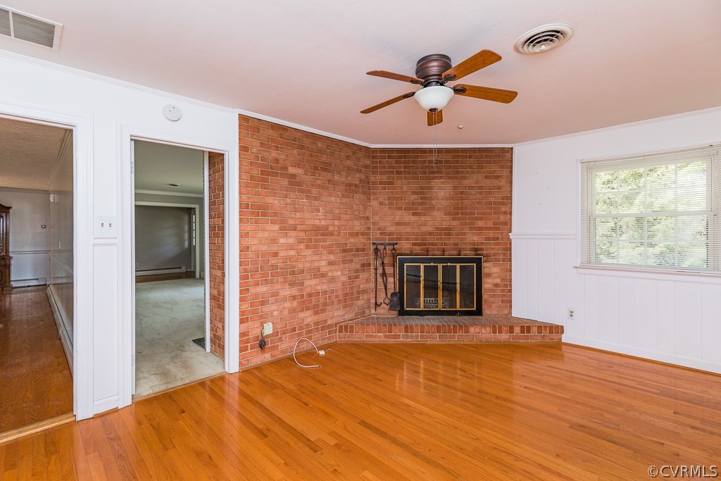 10801 Genito Road Chesterfield, VA 23832 - Photo 16 of 46 a view of empty room with wooden floor