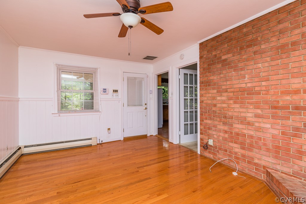 10801 Genito Road Chesterfield, VA 23832 - Photo 18 of 46 a view of empty room with wooden floor and fan