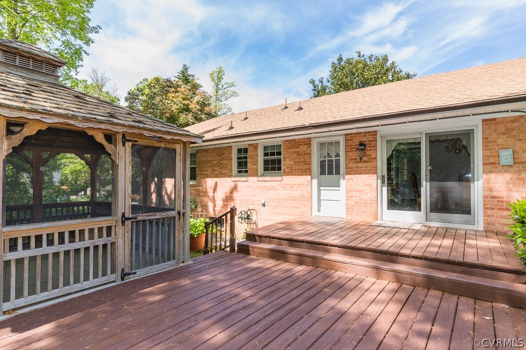 10801 Genito Road Chesterfield, VA 23832 - Photo 37 of 46 a porch with seating space and hardwood floor