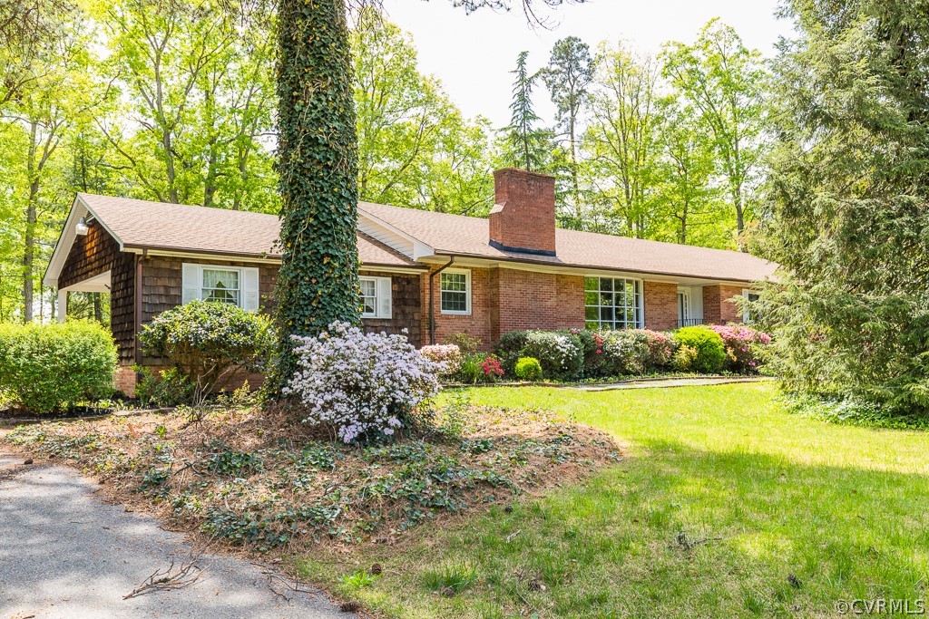 10801 Genito Road Chesterfield, VA 23832 - Photo 43 of 46 a front view of a house with garden