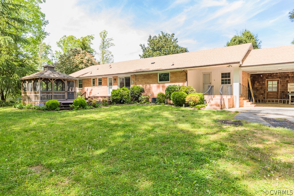 10801 Genito Road Chesterfield, VA 23832 - Photo 44 of 46 a front view of a house with garden