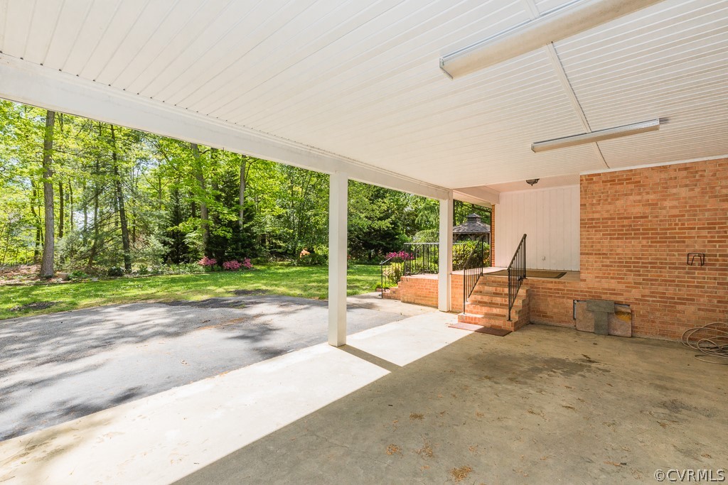 10801 Genito Road Chesterfield, VA 23832 - Photo 7 of 46 a view of a swimming pool with a patio