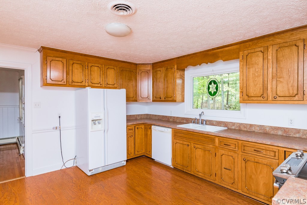 10801 Genito Road Chesterfield, VA 23832 - Photo 8 of 46 a kitchen with stainless steel appliances granite countertop a sink and cabinets