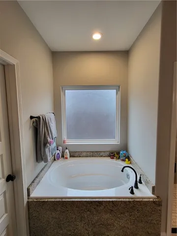 a view of a house with a large window