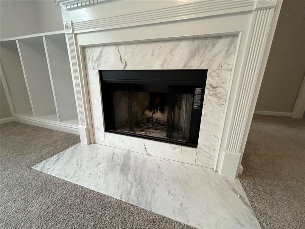 95 Luke Drive Dallas, GA 30132 - Photo 6 of 15 a living room with a fireplace