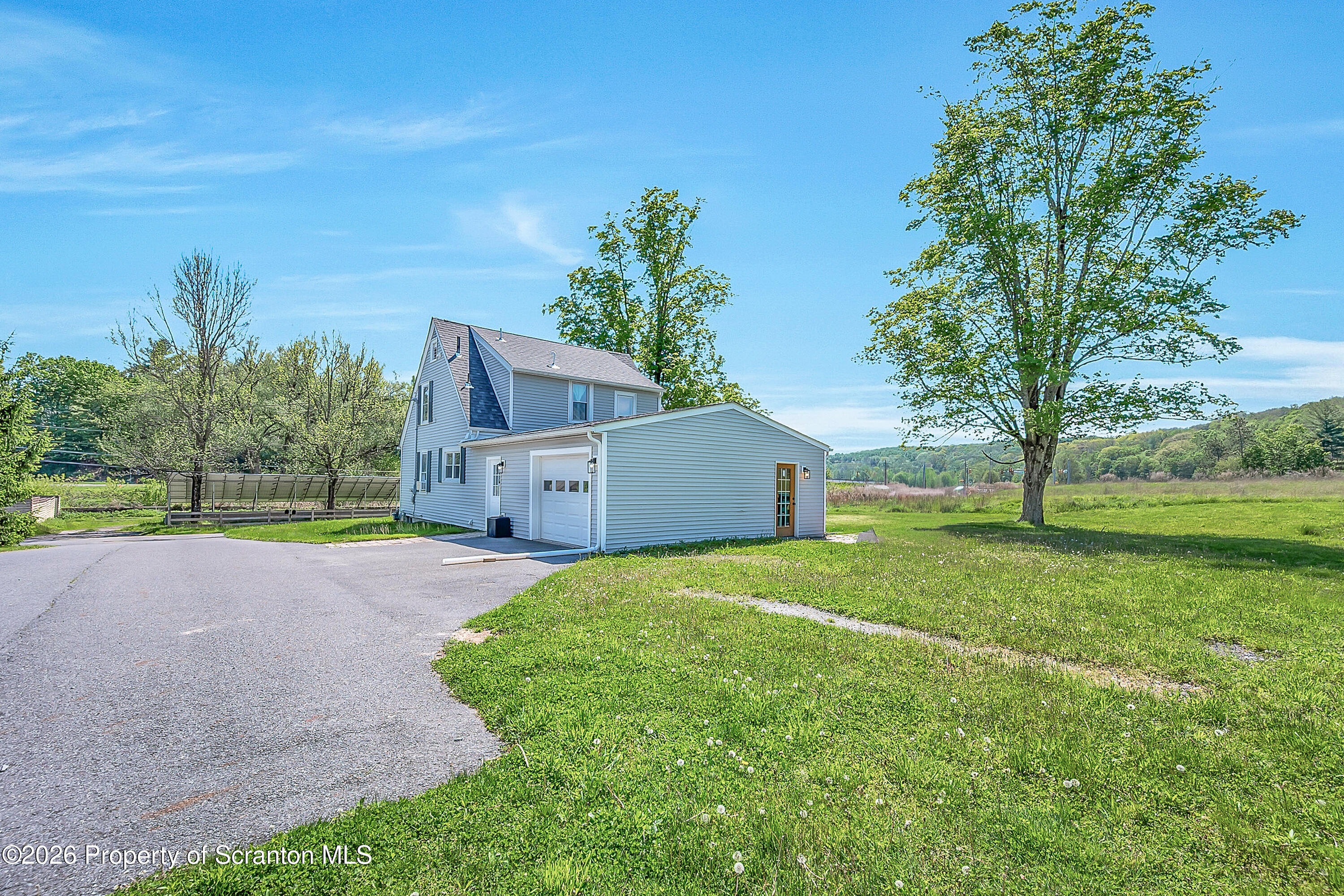 109 Ackerly Road Clarks Summit, PA 18411 - Photo 7 of 49 Side and Garage