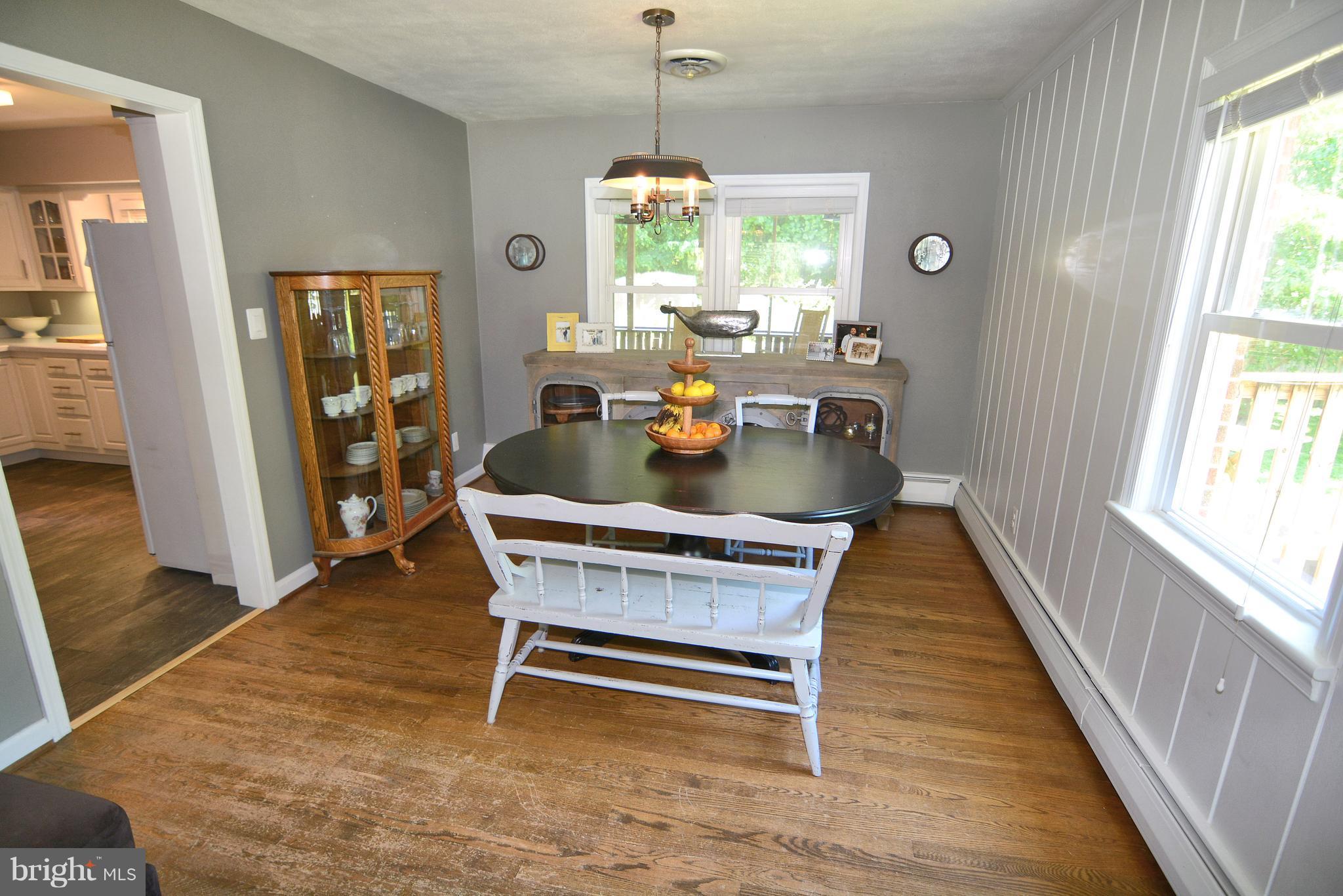 515 Ridge Road Annapolis, MD 21401 - Photo 5 of 29 Wood floors in dining off kitchen and living.