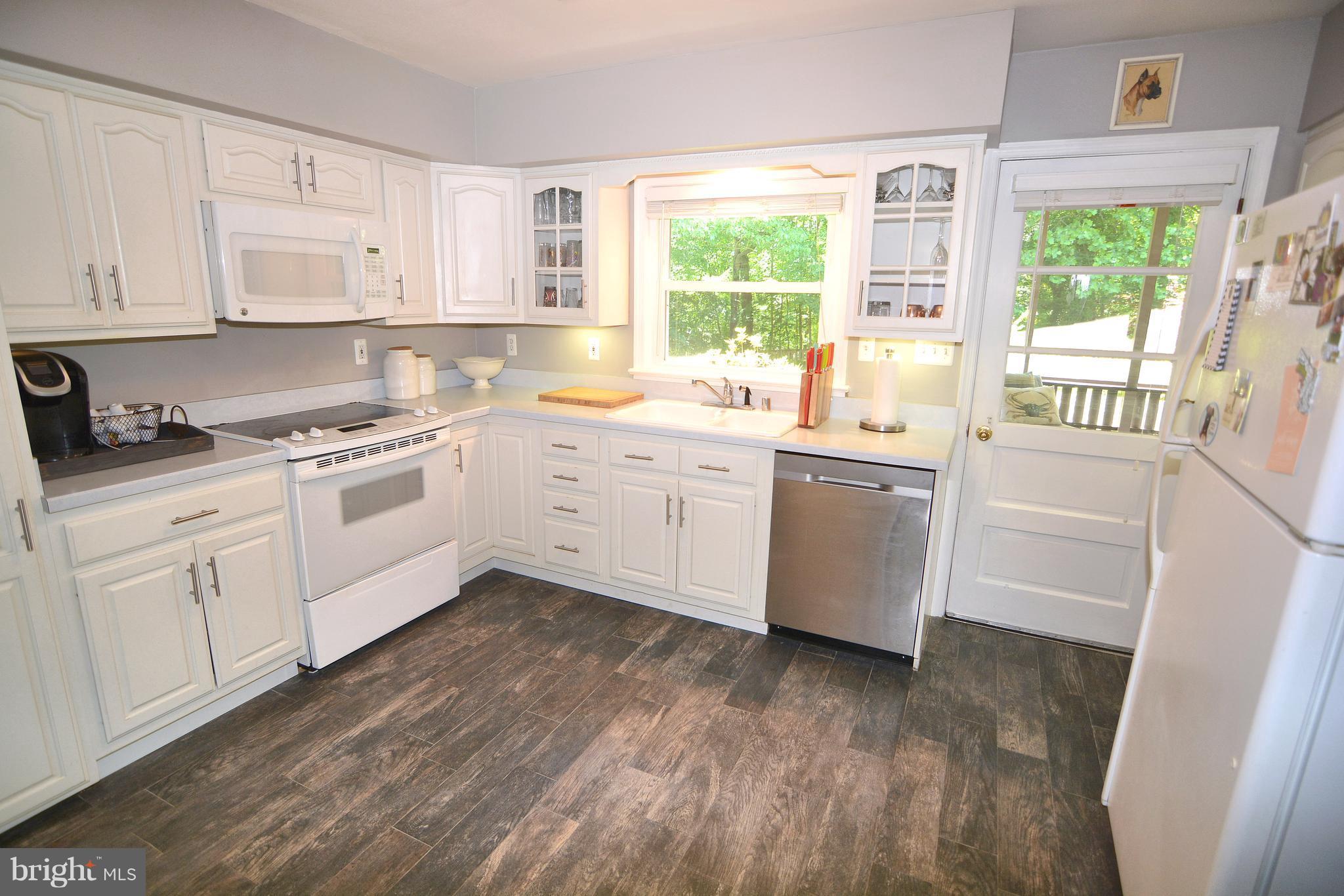 515 Ridge Road Annapolis, MD 21401 - Photo 7 of 29 White cabinets for a bright and fresh space.