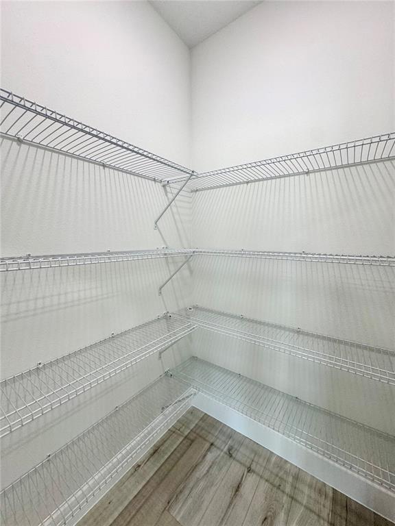 1690 Hamilton Avenue Southwest Palm Bay, FL 32908 - Photo 32 of 56 a view of a room with racks on the wall