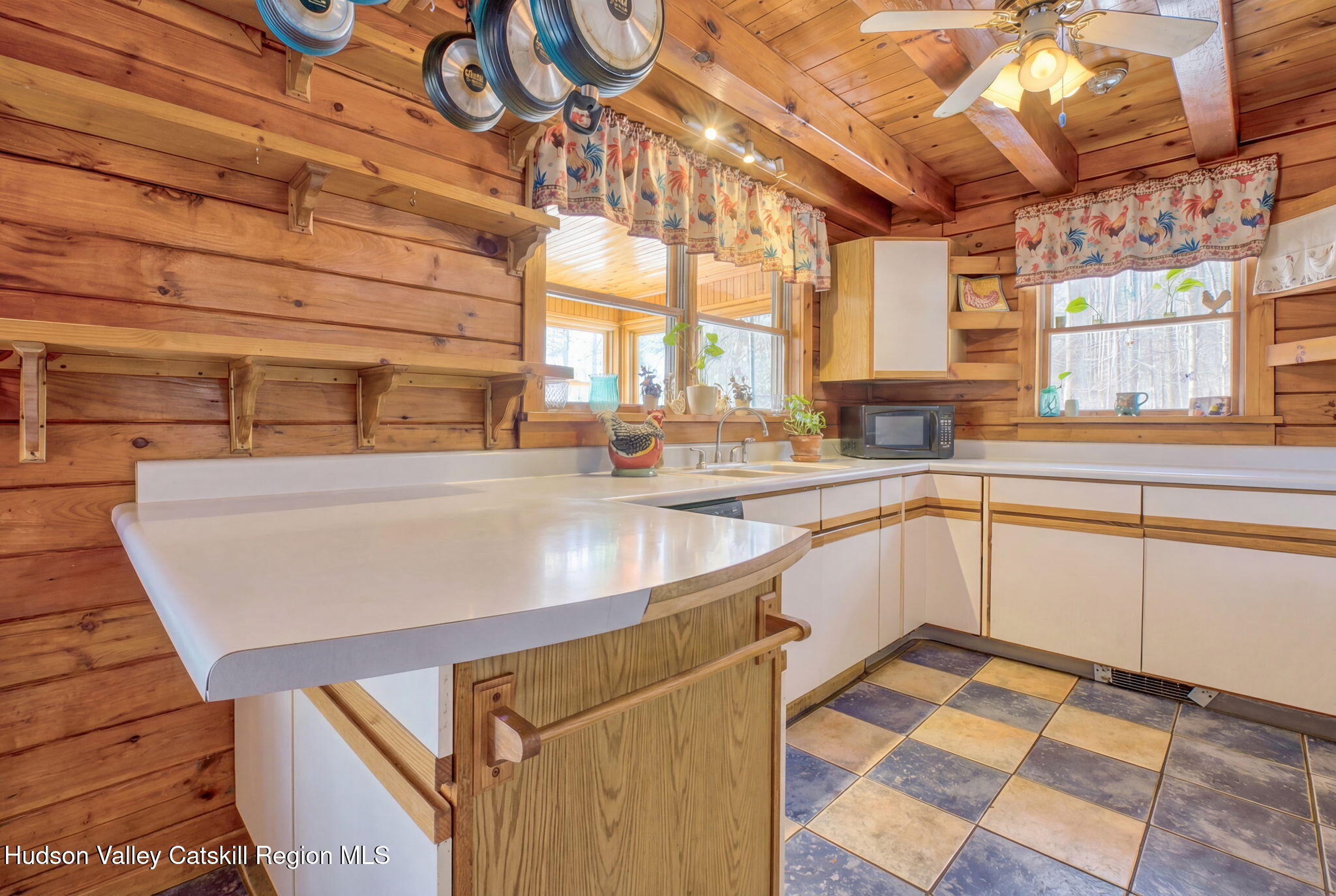 189 Yeagerville Road Napanoch, NY 12458 - Photo 11 of 38 a kitchen with stainless steel appliances kitchen island granite countertop a sink and a cabinets