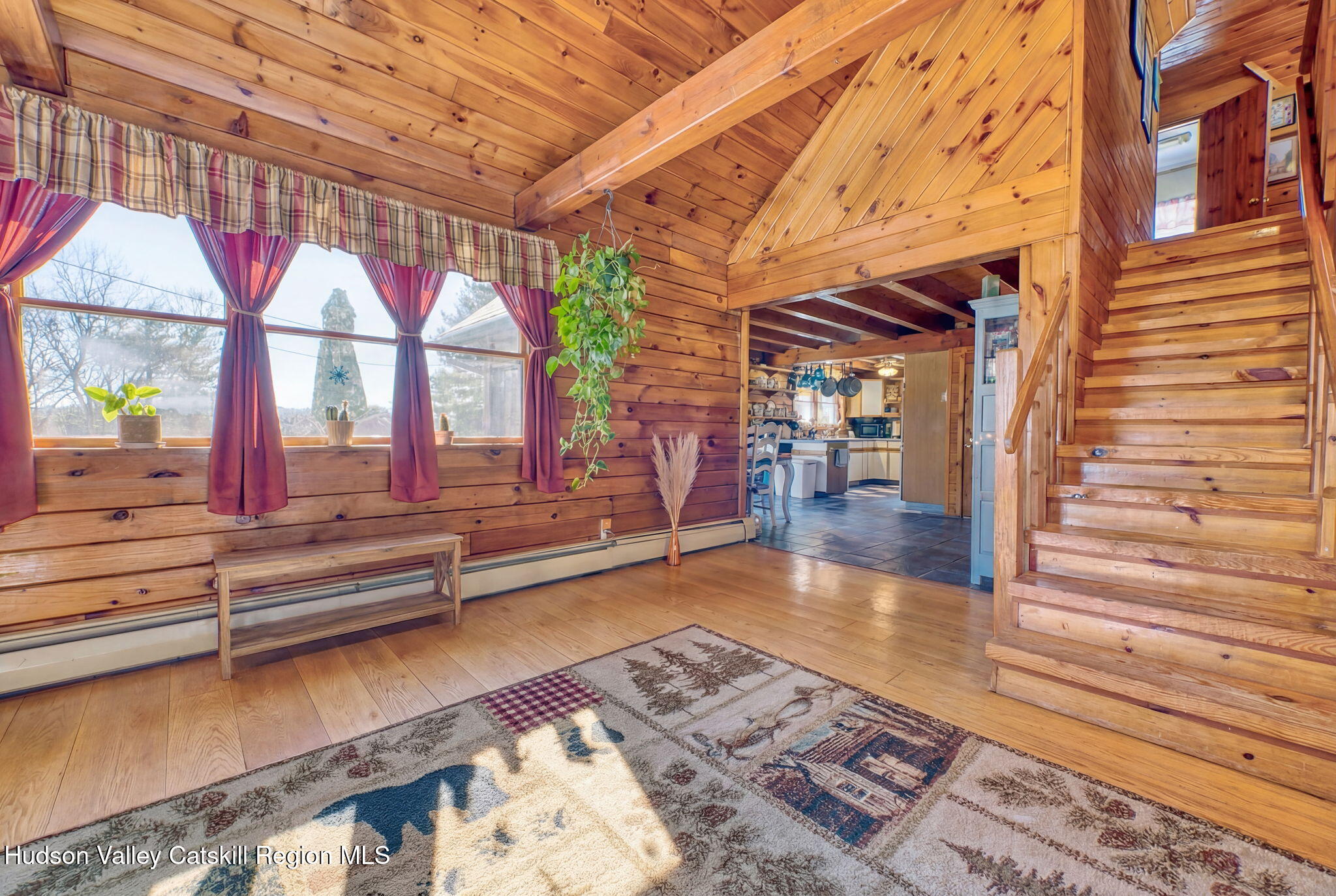 189 Yeagerville Road Napanoch, NY 12458 - Photo 13 of 38 a room with lots of wooden furniture and a rug