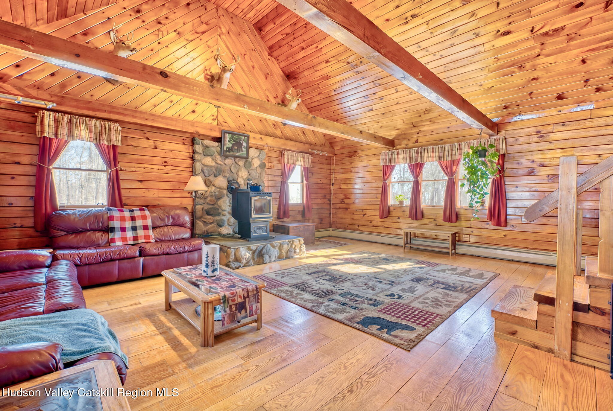 189 Yeagerville Road Napanoch, NY 12458 - Photo 15 of 38 a living room with couch and a table