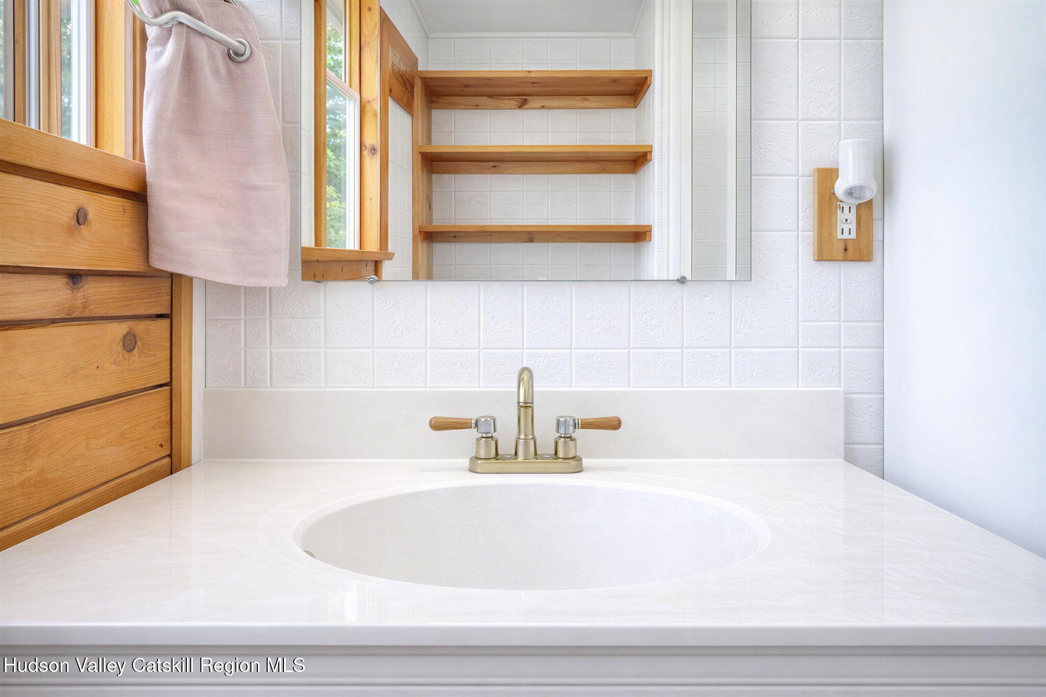189 Yeagerville Road Napanoch, NY 12458 - Photo 31 of 38 a bathroom with a sink and a window