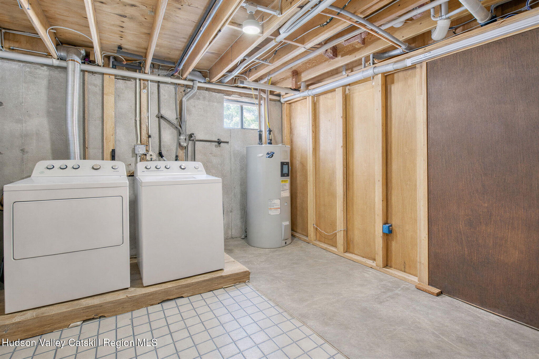 189 Yeagerville Road Napanoch, NY 12458 - Photo 32 of 38 a utility room with dryer and washer