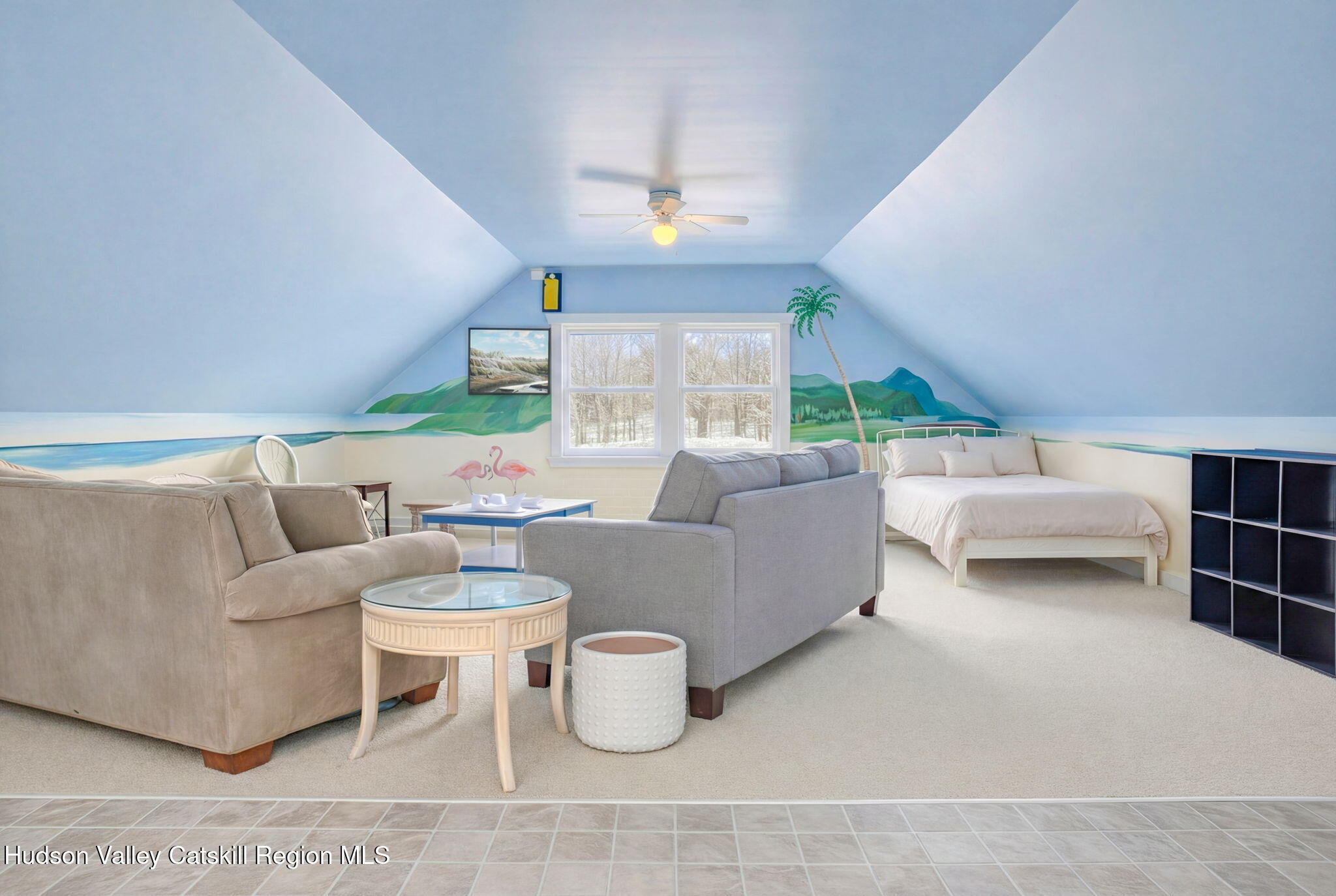 189 Yeagerville Road Napanoch, NY 12458 - Photo 38 of 38 a living room with furniture and a chandelier