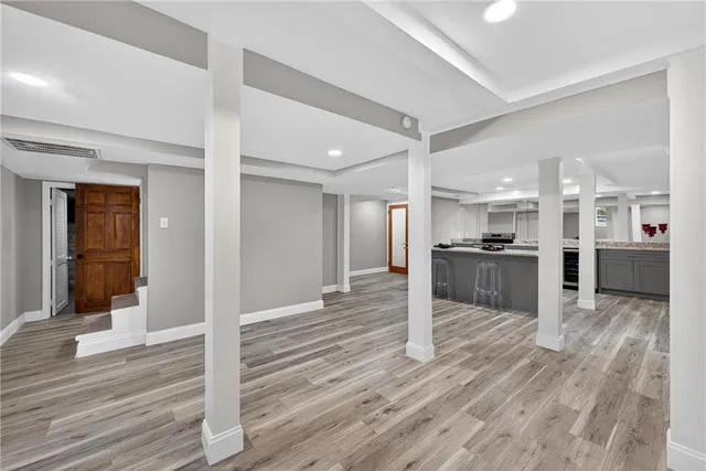 a view of kitchen with wooden floor