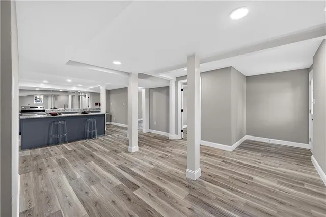 a view of kitchen with wooden floor