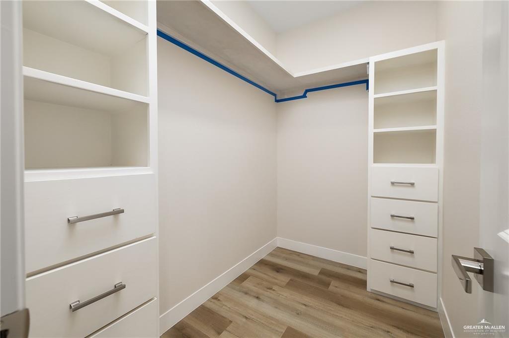 2507 Regina Street Mission, TX 78574 - Photo 10 of 16 a view of walk in closet with empty racks