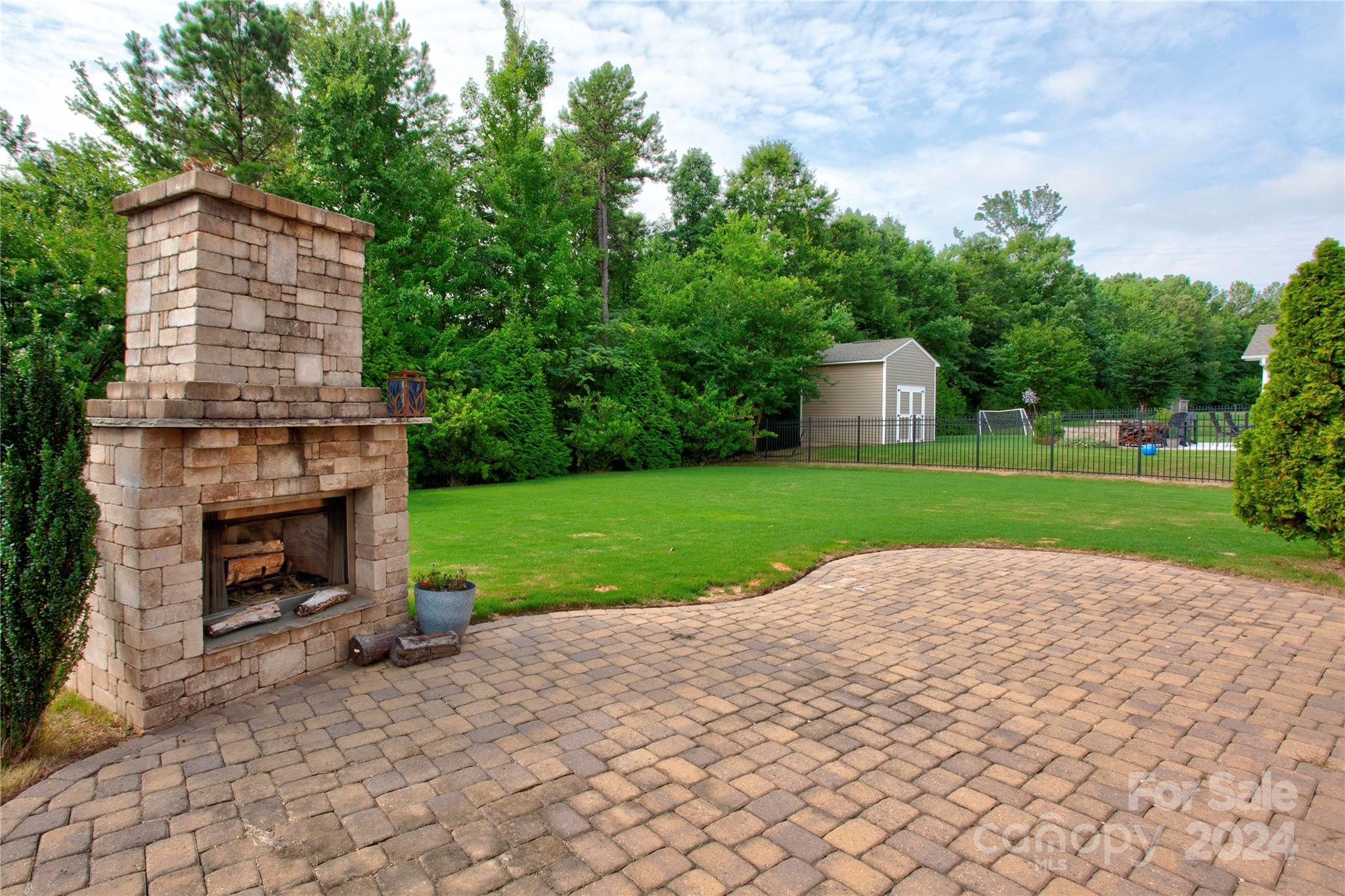 8899 Happiness Road Harrisburg, NC 28075 - Photo 26 of 30 a view of a porch with a yard