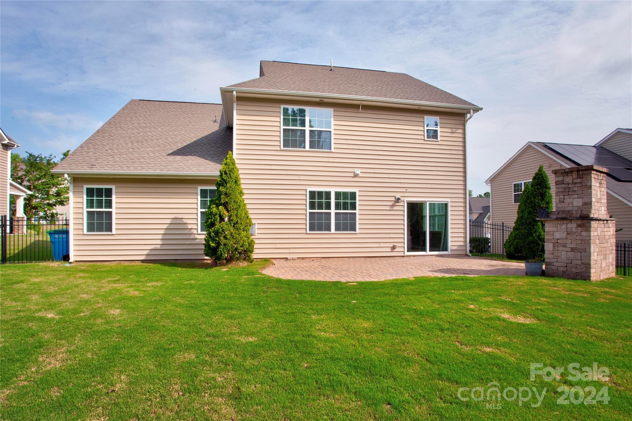 8899 Happiness Road Harrisburg, NC 28075 - Photo 29 of 30 a front view of a house with a garden