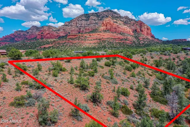 a view of a houses with a road