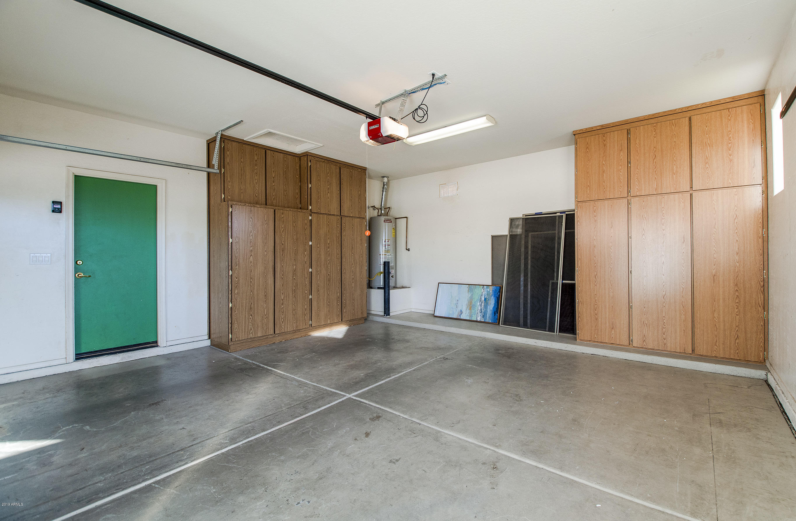 3236 East Phelps Street Gilbert, AZ 85295 - Photo 25 of 29 a view of a livingroom with a ceiling fan and window