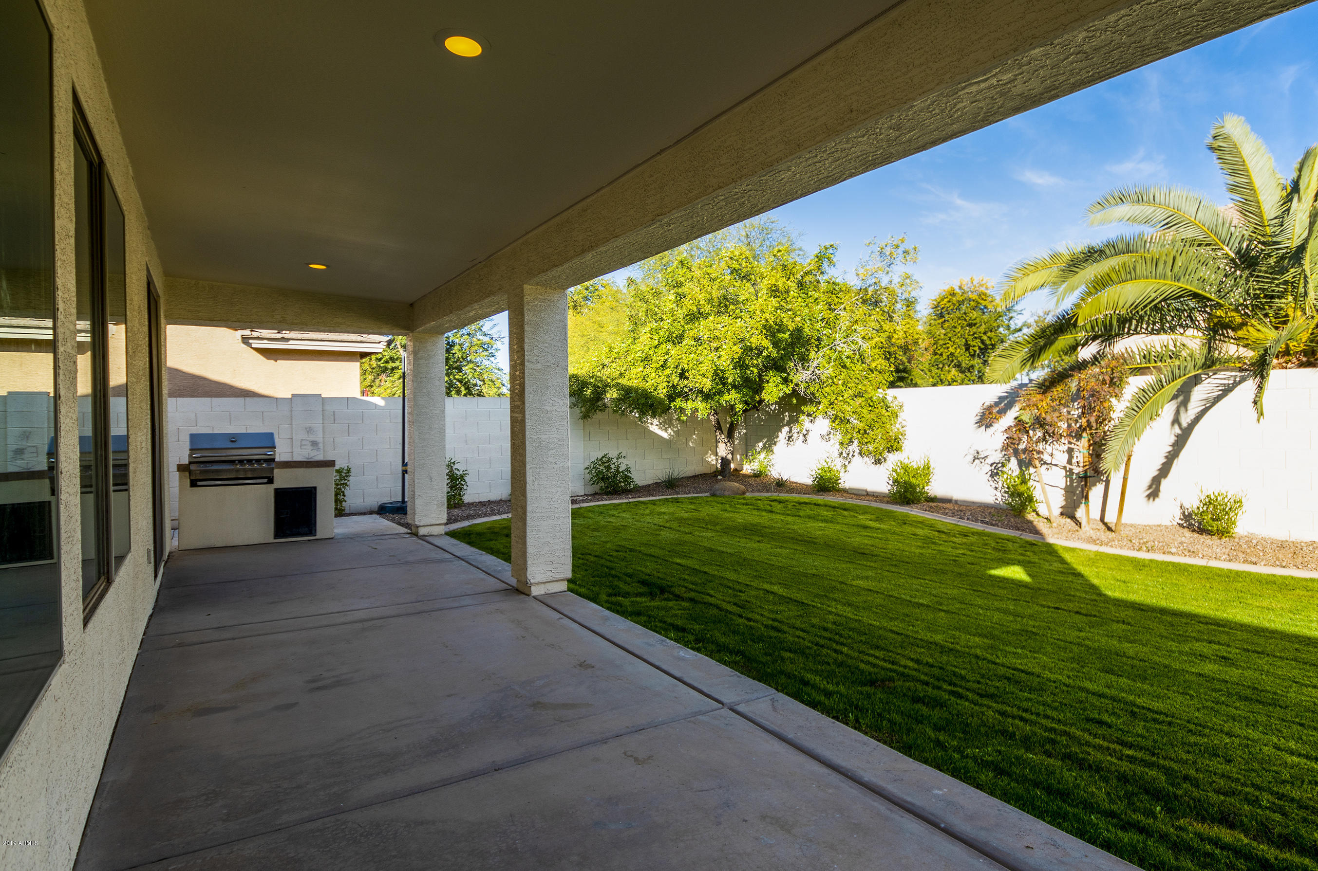 3236 East Phelps Street Gilbert, AZ 85295 - Photo 28 of 29 a view of a porch and garden