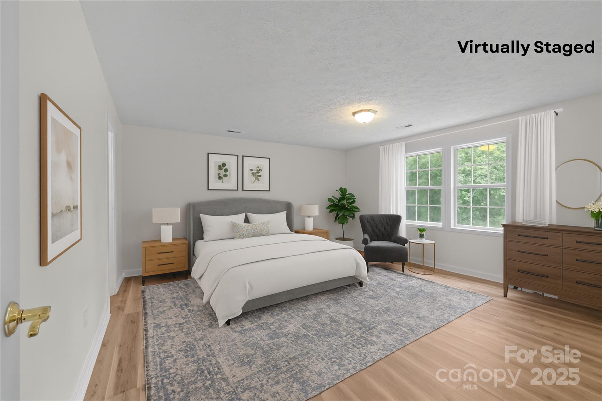 25611 Bridgeport Road Albemarle, NC 28001 - Photo 23 of 47 a bedroom with a large bed and a window