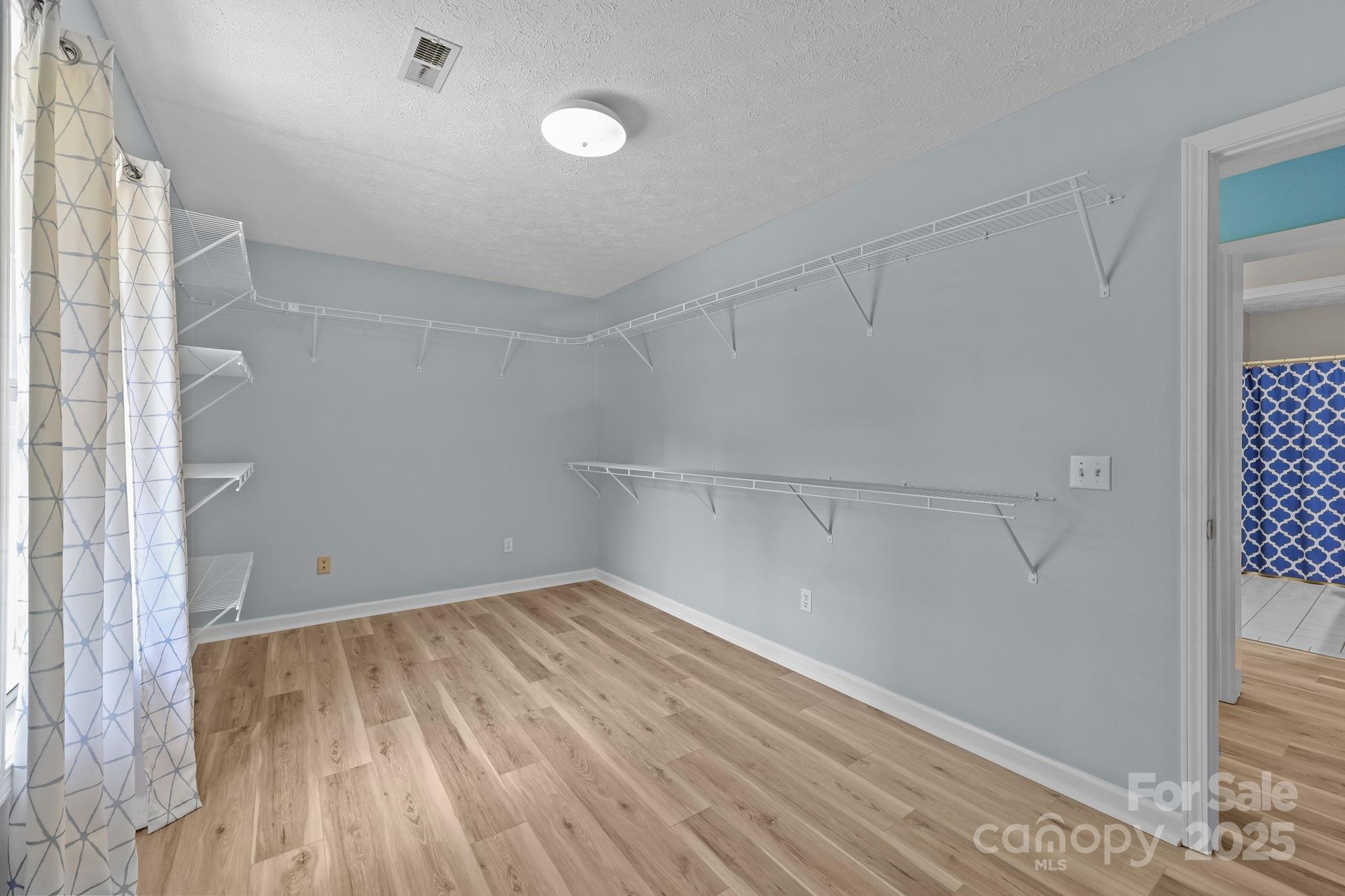 25611 Bridgeport Road Albemarle, NC 28001 - Photo 33 of 47 wooden floor in an empty room with a window