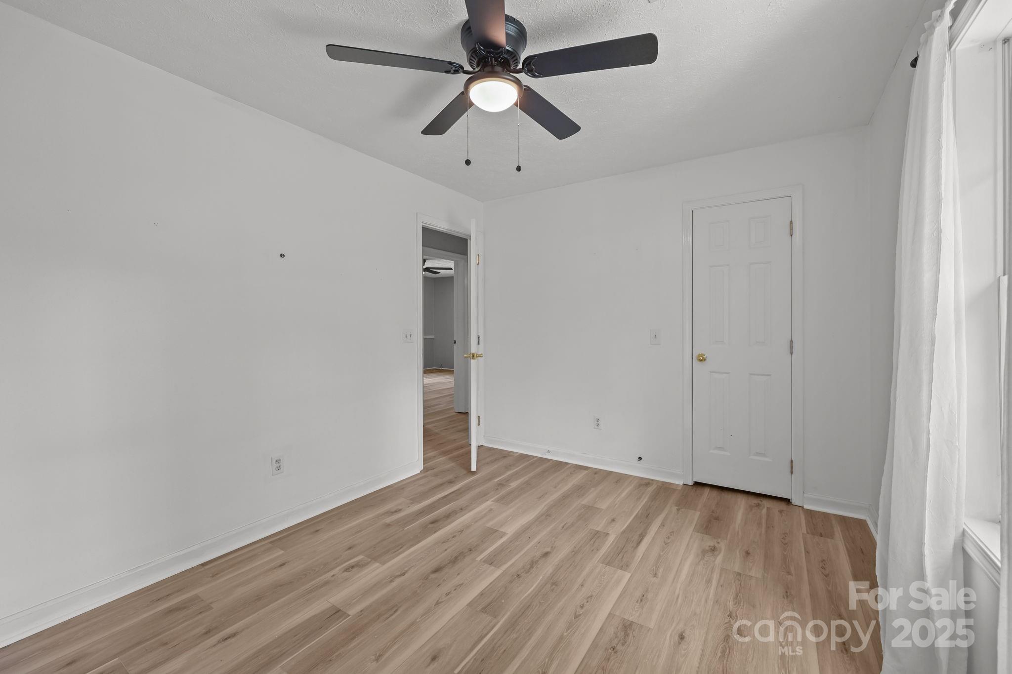 25611 Bridgeport Road Albemarle, NC 28001 - Photo 37 of 47 wooden floor in an empty room