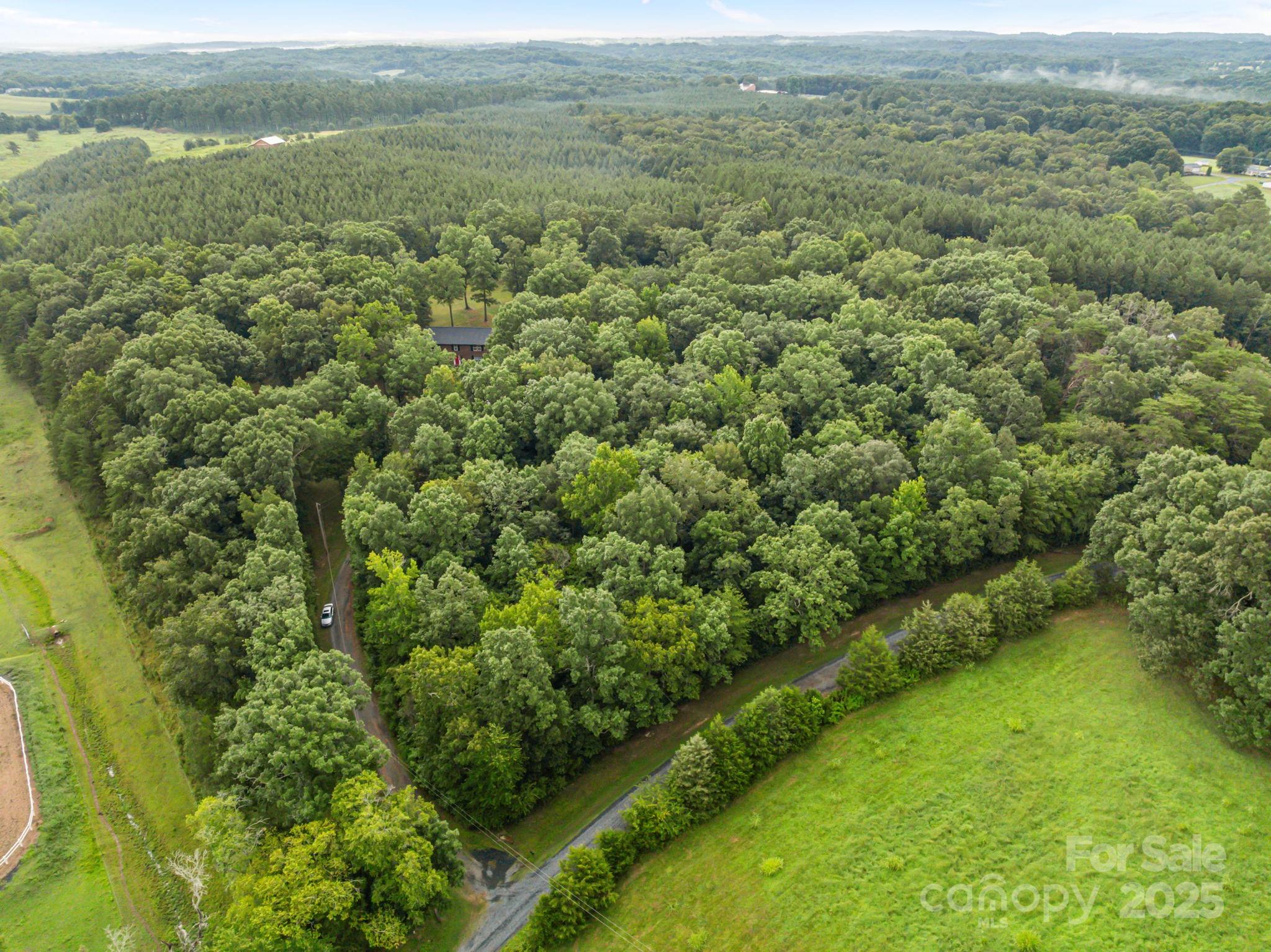 25611 Bridgeport Road Albemarle, NC 28001 - Photo 45 of 47 a view of a field with an ocean view