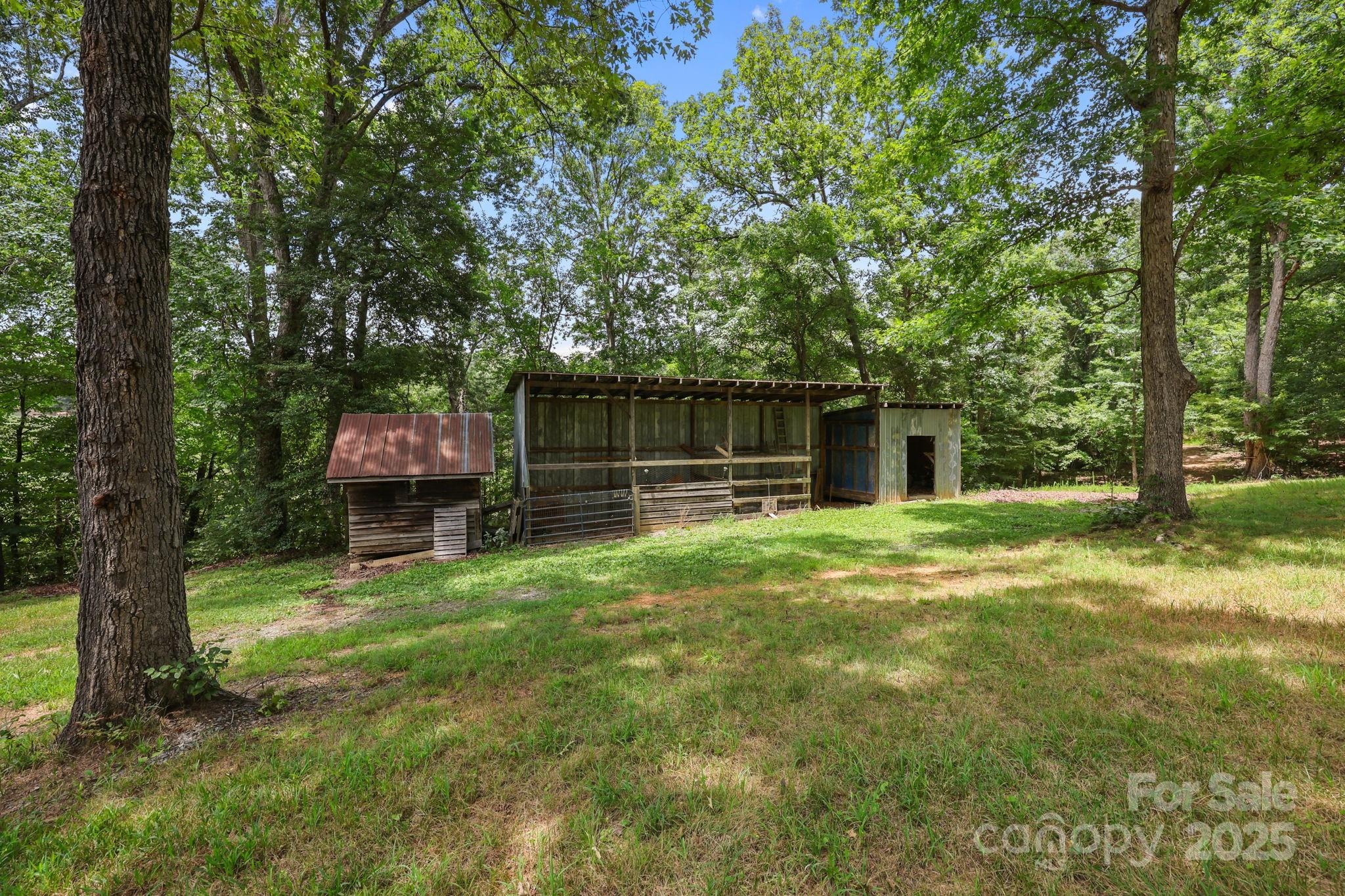 25611 Bridgeport Road Albemarle, NC 28001 - Photo 46 of 47 a view of a house with backyard