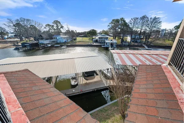 a view of roof deck with patio