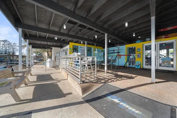 a view of a porch with furniture