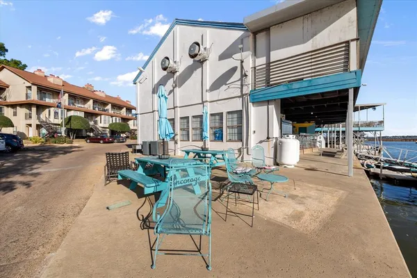 a view of a building with sitting area