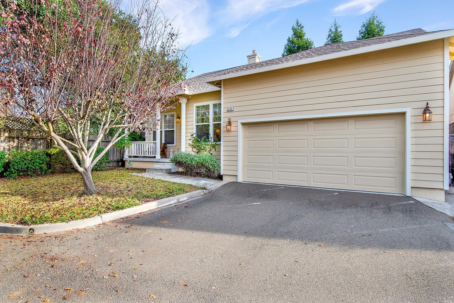 2425 Guerneville Road Santa Rosa, CA 95403 - Photo 1 of 1 a front view of house with garage