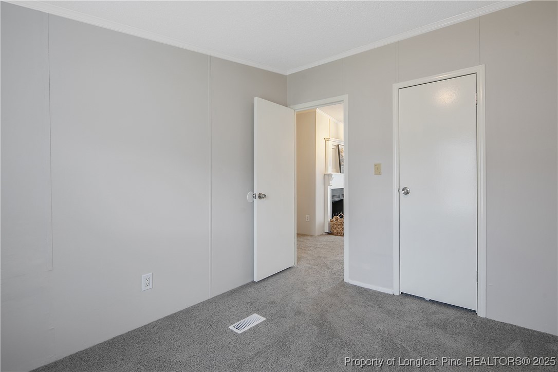 43 Columbus Court Spring Lake, NC 28390 - Photo 14 of 22 a view of hallway with closet