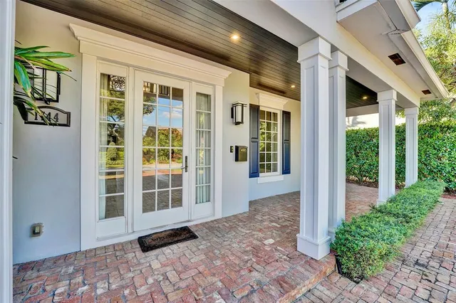 a kitchen with stainless steel appliances granite countertop a stove and a sink