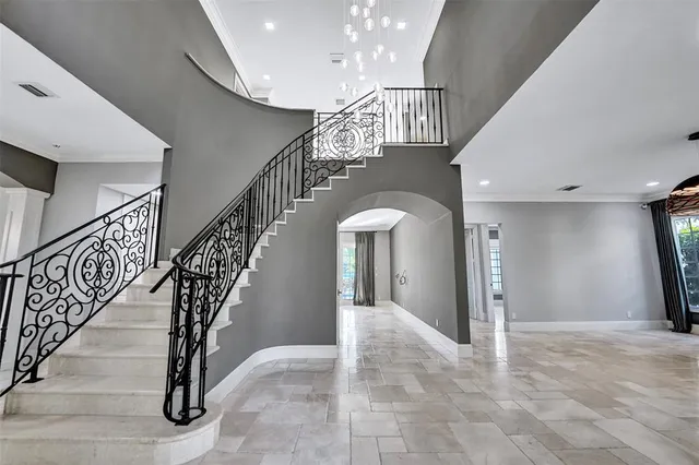 a kitchen with stainless steel appliances granite countertop a sink and cabinets