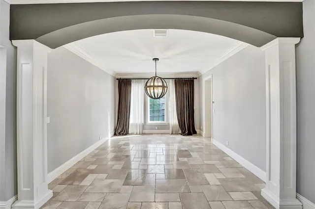 a view of a kitchen with kitchen island stainless steel appliances refrigerator sink and cabinets