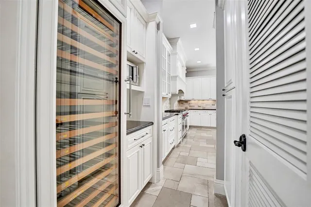 a view of a hallway with a bedroom