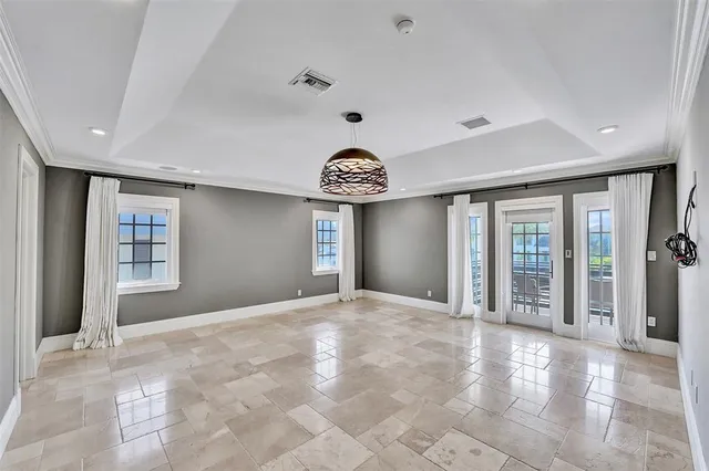 a view of a livingroom with hardwood and furniture