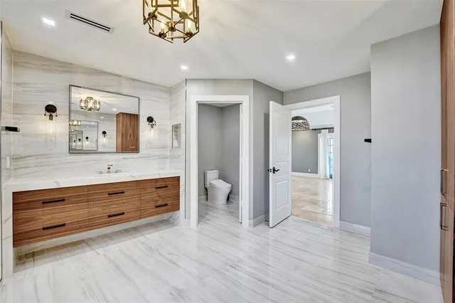 a view of a house with a swimming pool